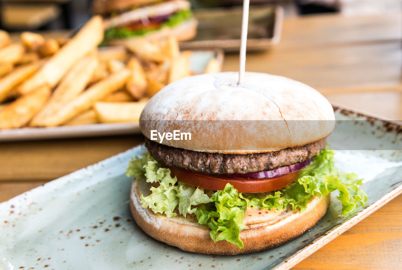 Close-up of served hamburger