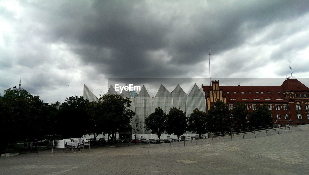 VIEW OF CLOUDY SKY OVER BUILDINGS