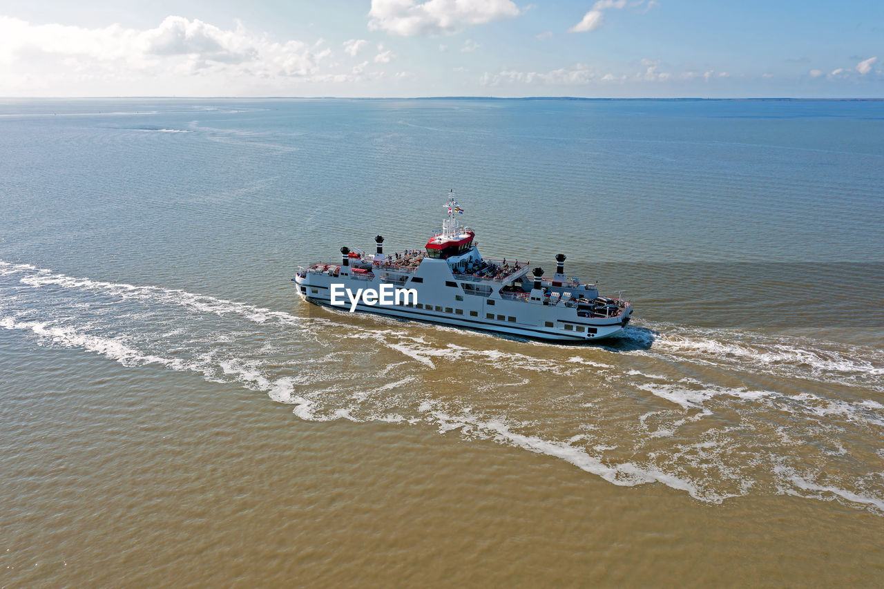 Aerial from the ferry to ameland on the wadden sea in the netherlands