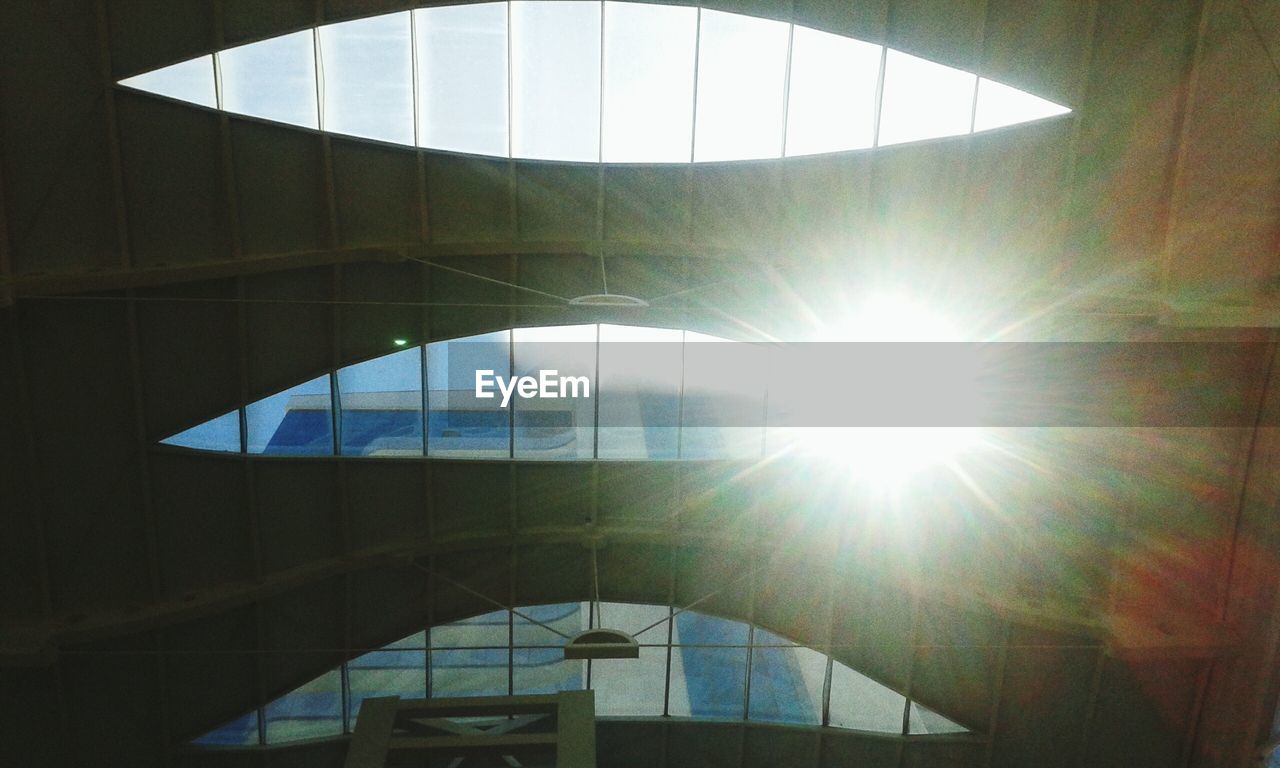 SUN SHINING THROUGH WINDOW
