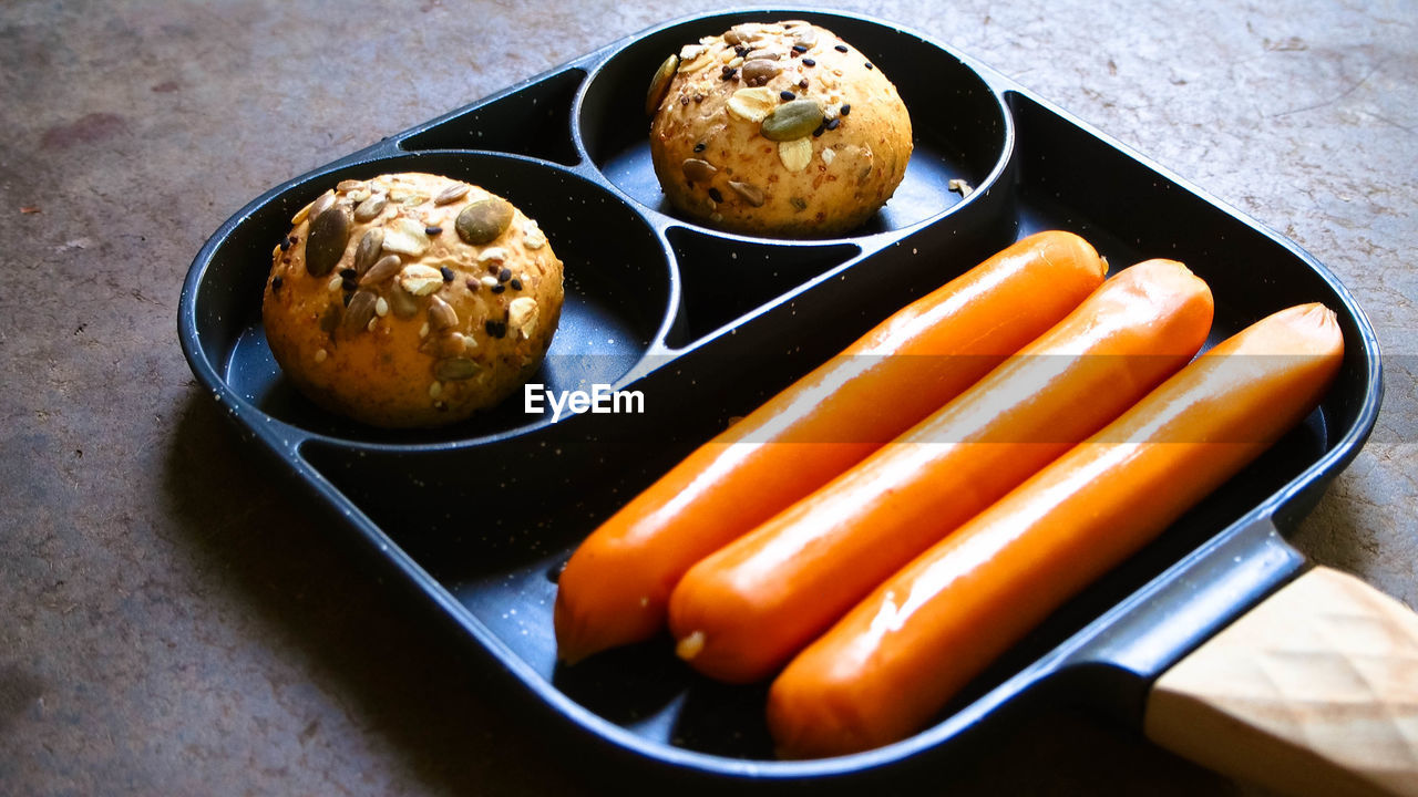 food and drink, food, freshness, meal, fast food, healthy eating, high angle view, dish, produce, carrot, no people, indoors, root vegetable, breakfast, still life, vegetable, wellbeing, table, plate, studio shot, baked, sweet food, tray, kitchen utensil