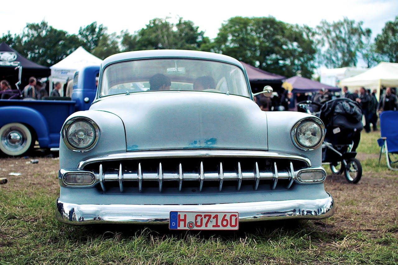 VINTAGE CAR PARKED ON CART