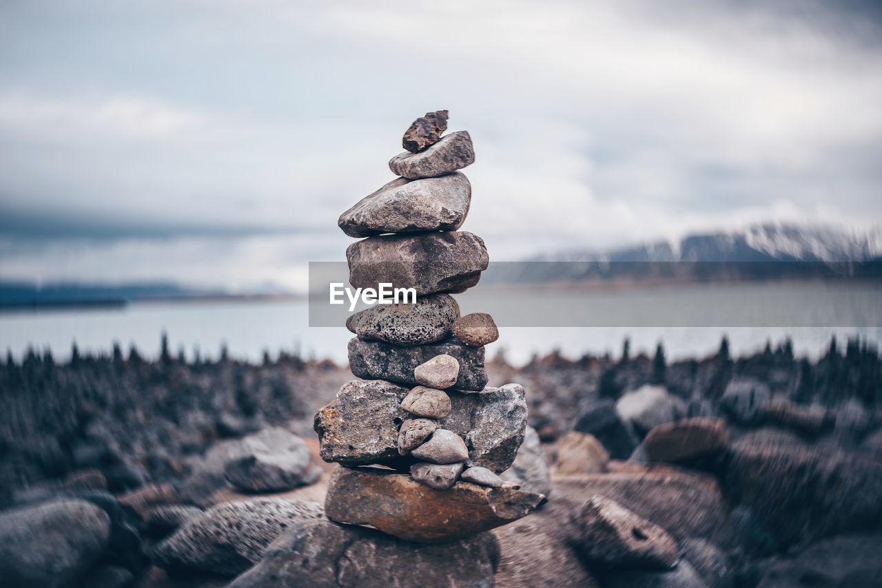 STACK OF PEBBLES ON SHORE