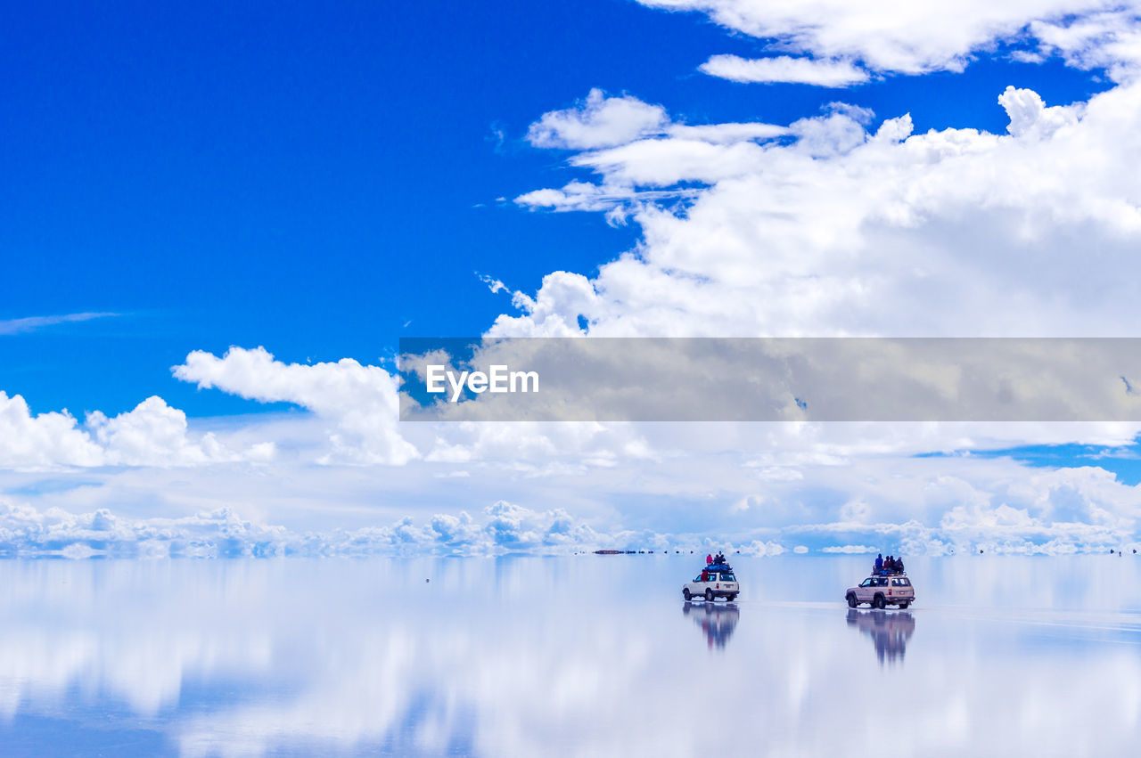 Scenic view of landscape against blue sky