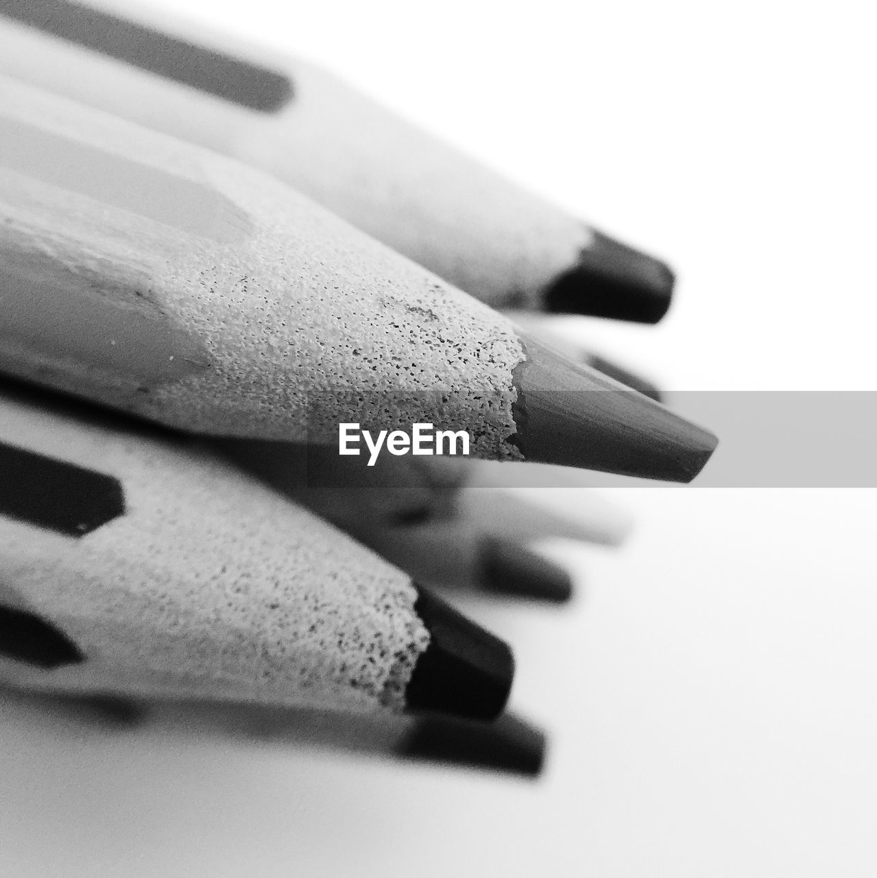 Close-up of pencils against white background