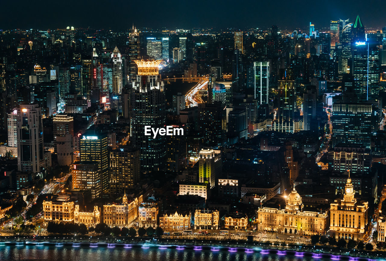 ILLUMINATED BUILDINGS AT NIGHT