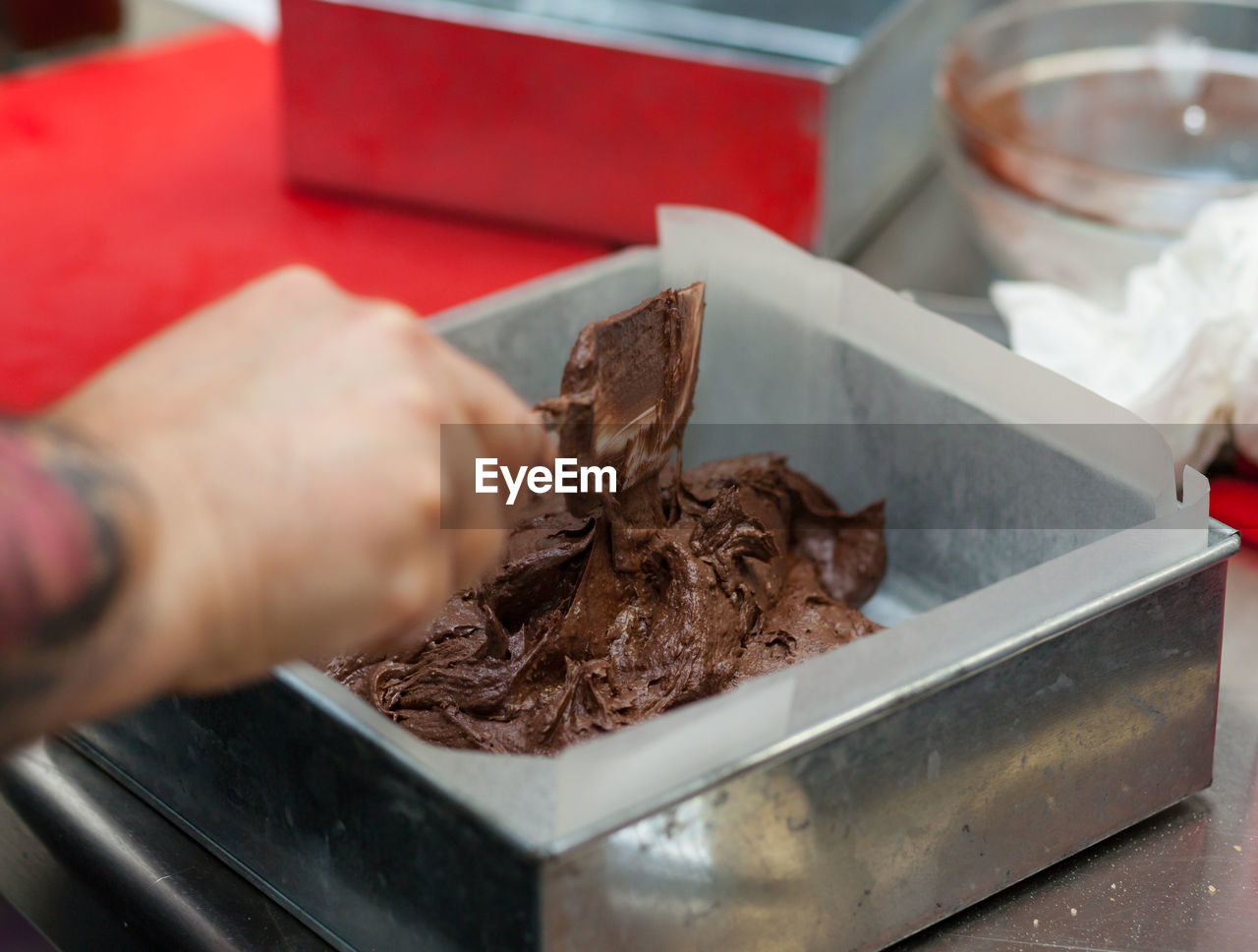 Making a pan of brownies.