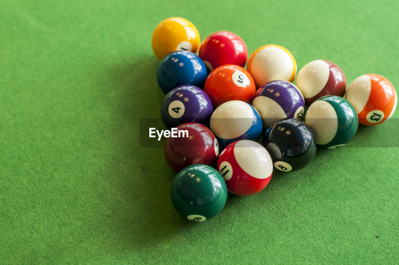 High angle view of multi colored balls on table