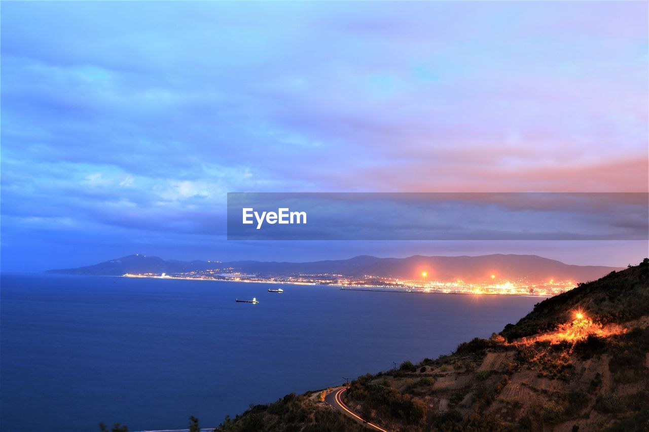 Scenic view of sea against sky at sunset