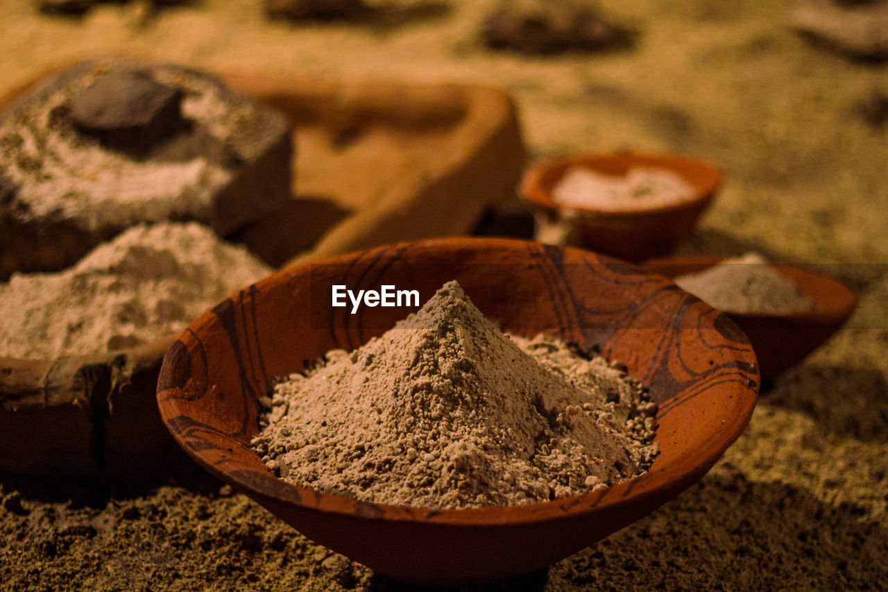 Close up spices in old clay bowls concept photo