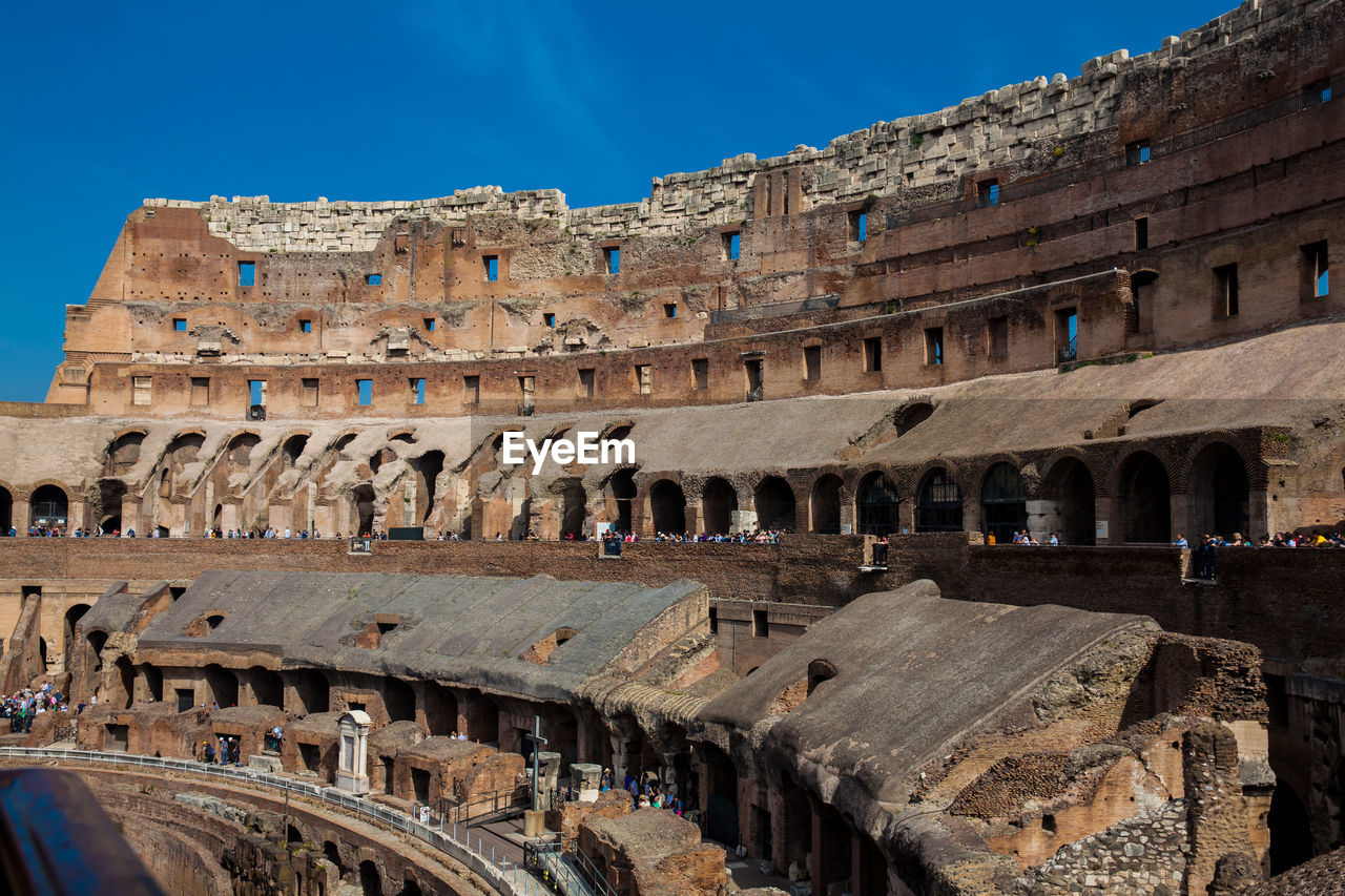 View of the seating areas and the hypogeum of the ancient colosseum in rome