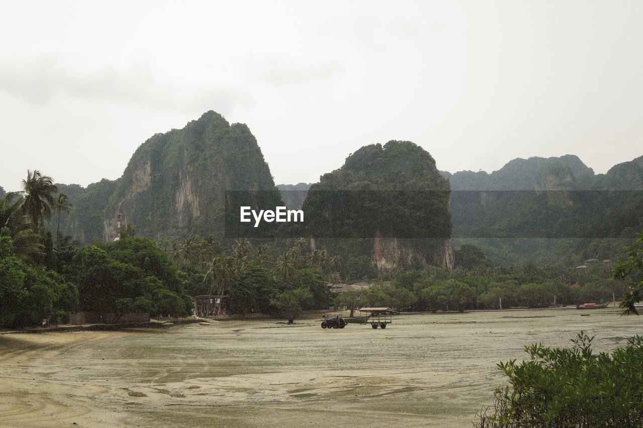 Scenic view of mountains surrounding bay