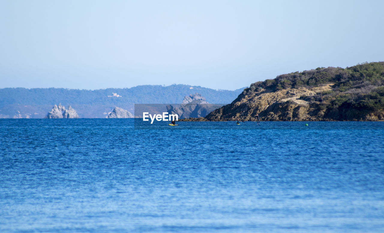 Scenic view of sea against clear sky