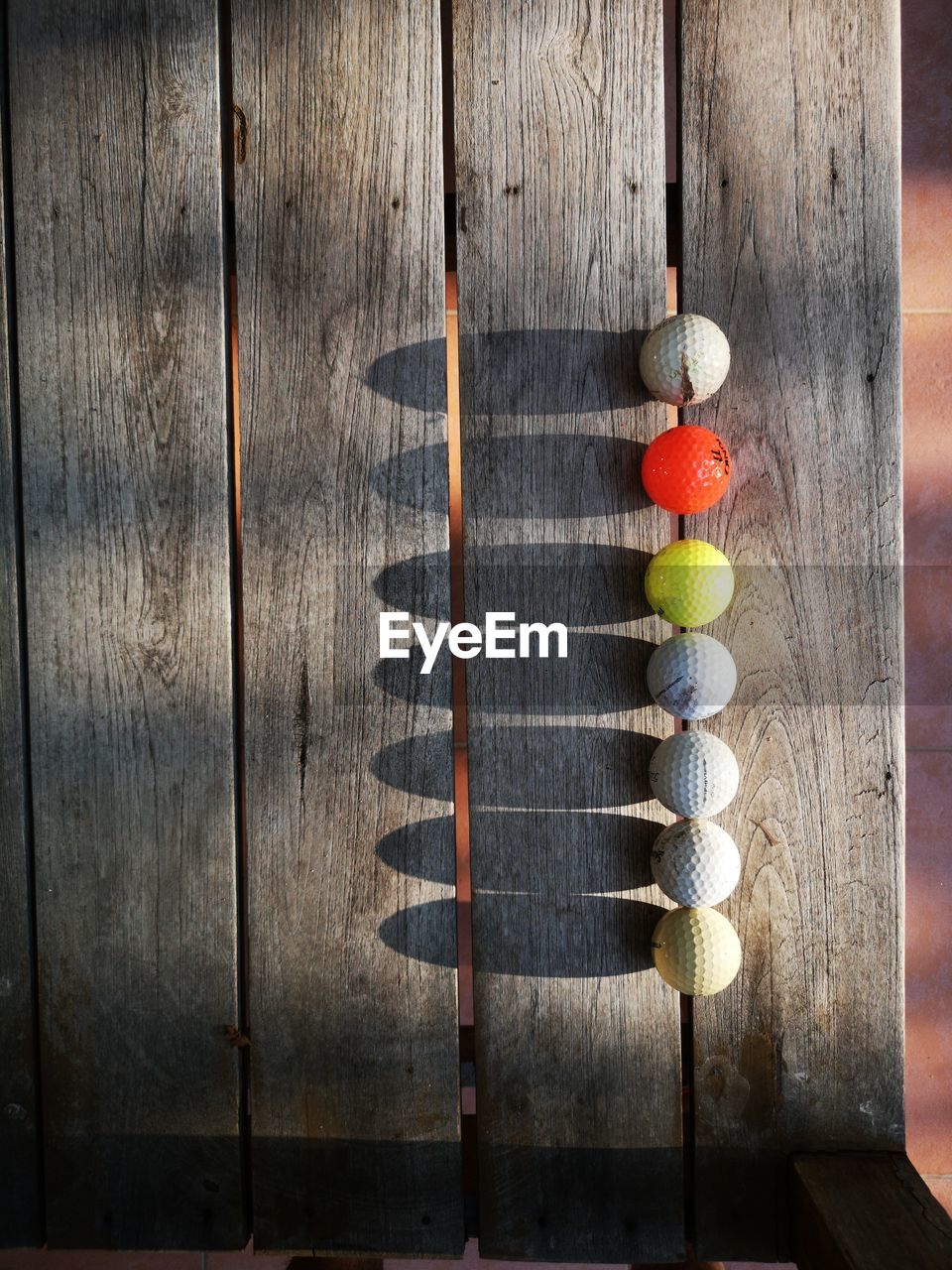 Directly above shot of golf balls on table