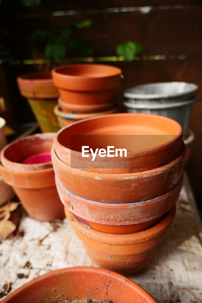 Clay pots on table at porch
