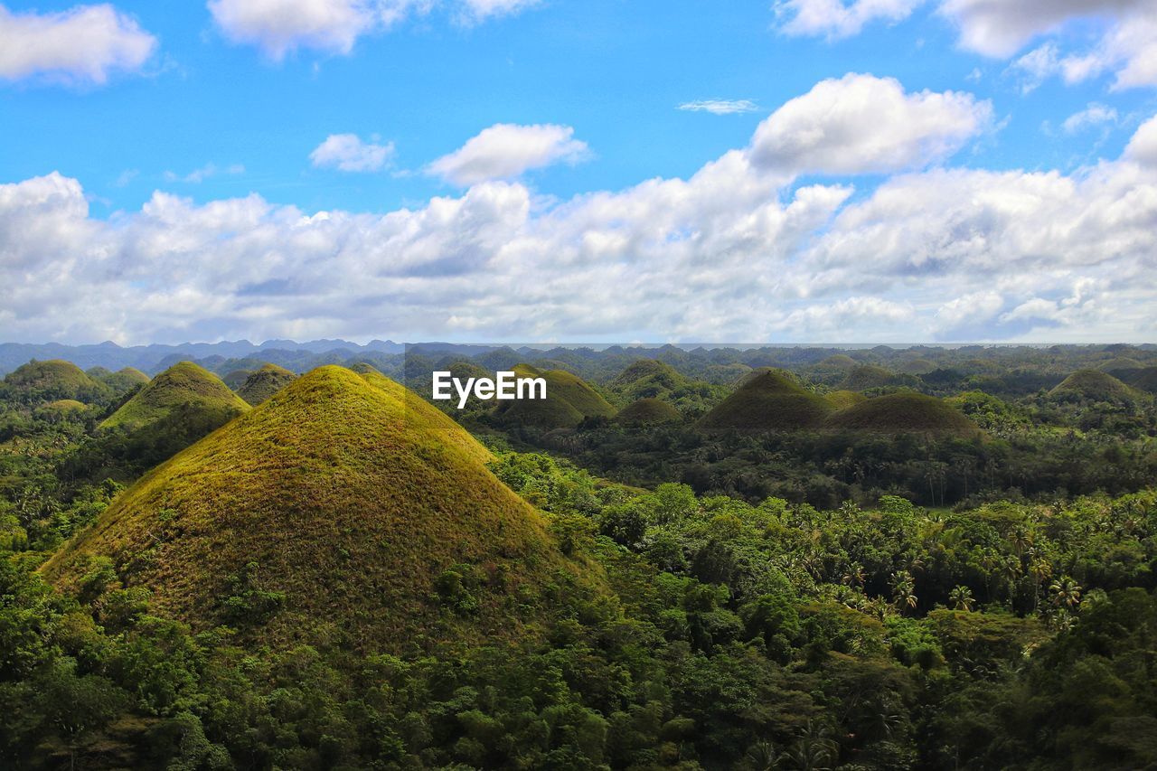 PANORAMIC VIEW OF LANDSCAPE AND MOUNTAINS AGAINST SKY