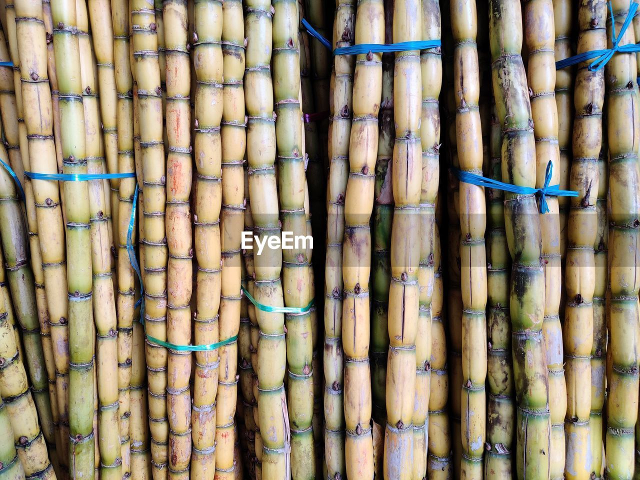 FULL FRAME SHOT OF BAMBOO FOR SALE AT MARKET