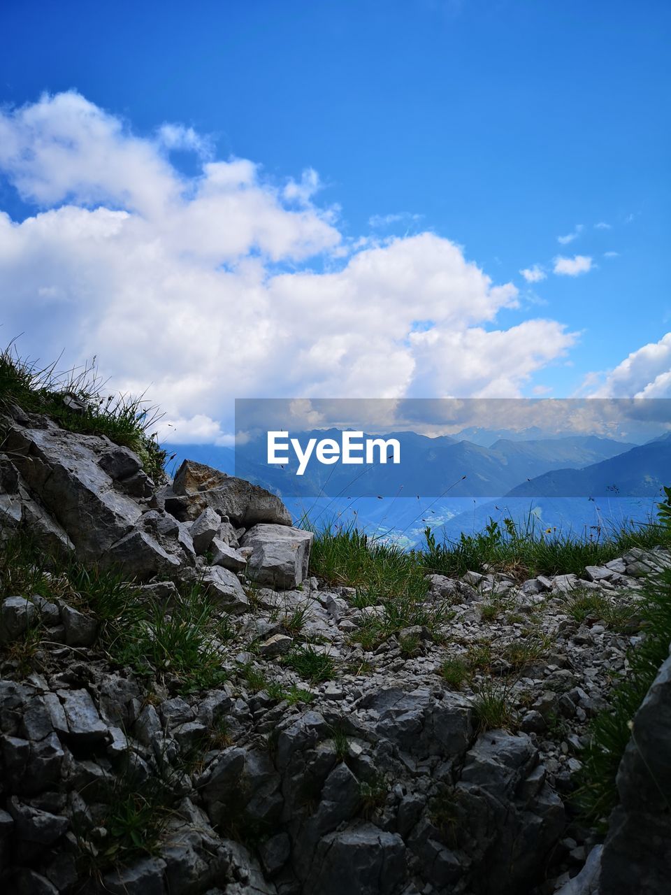 SCENIC VIEW OF MOUNTAIN RANGE AGAINST SKY