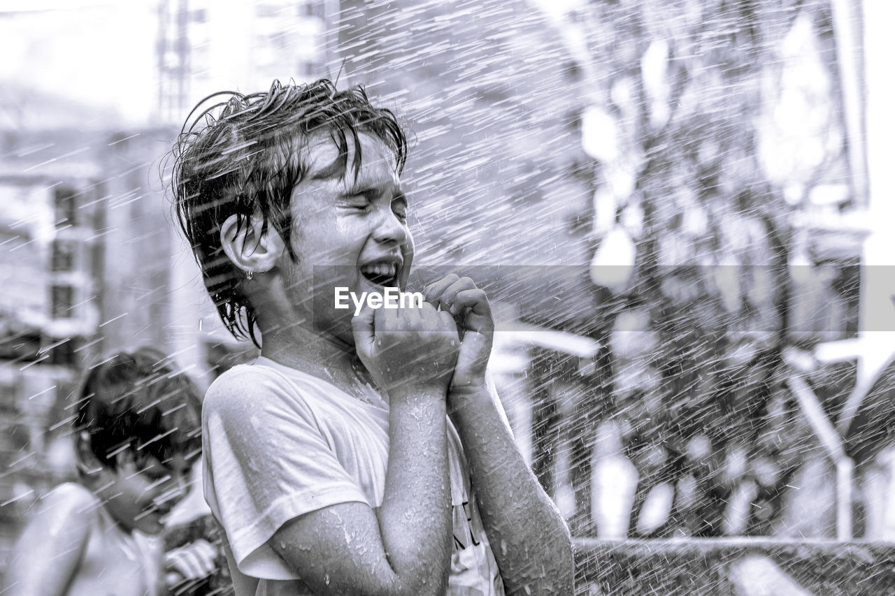 Portrait of smiling boy in water