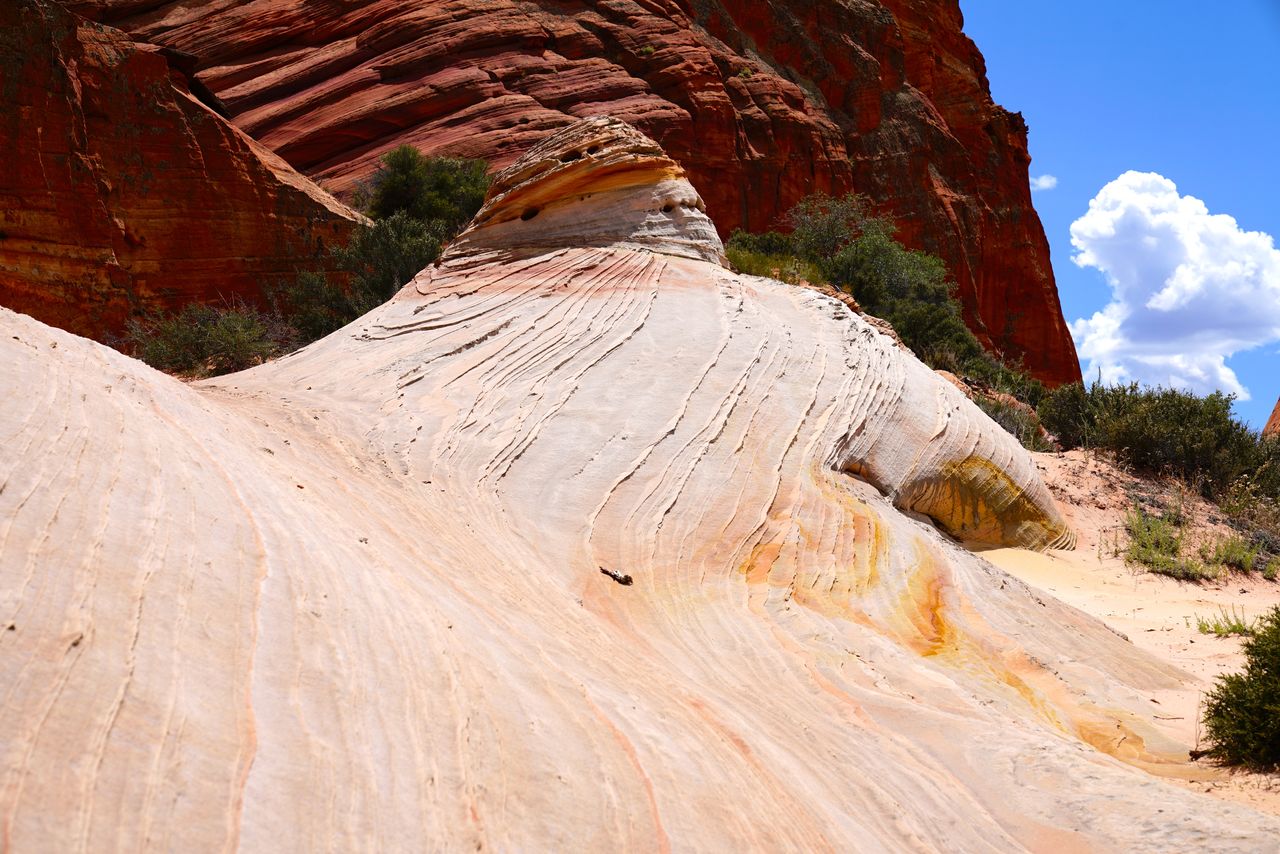 Low angle view of rock formations against sky