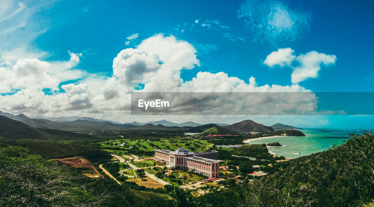 PANORAMIC VIEW OF BUILDINGS AGAINST SKY