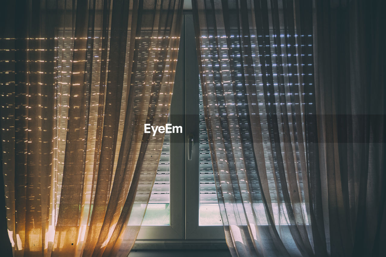 Sunlight streaming through glass window