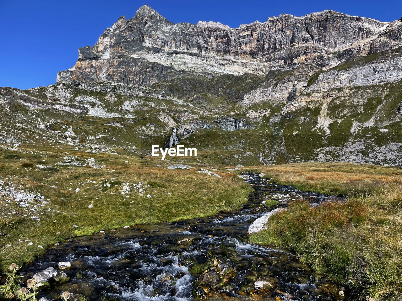 Glacial river and trails in vanoise national park, hautes alps, france