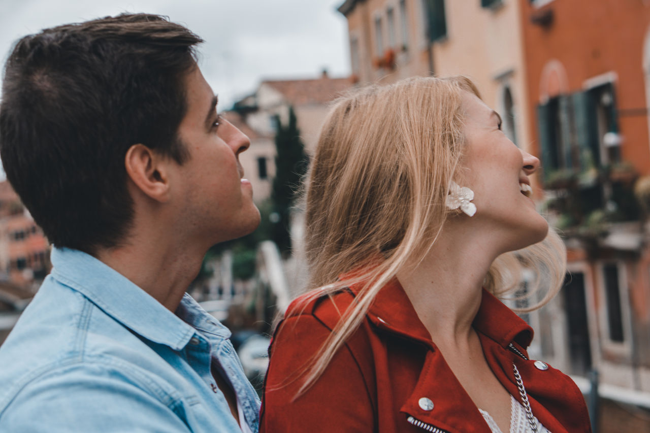 PORTRAIT OF COUPLE KISSING