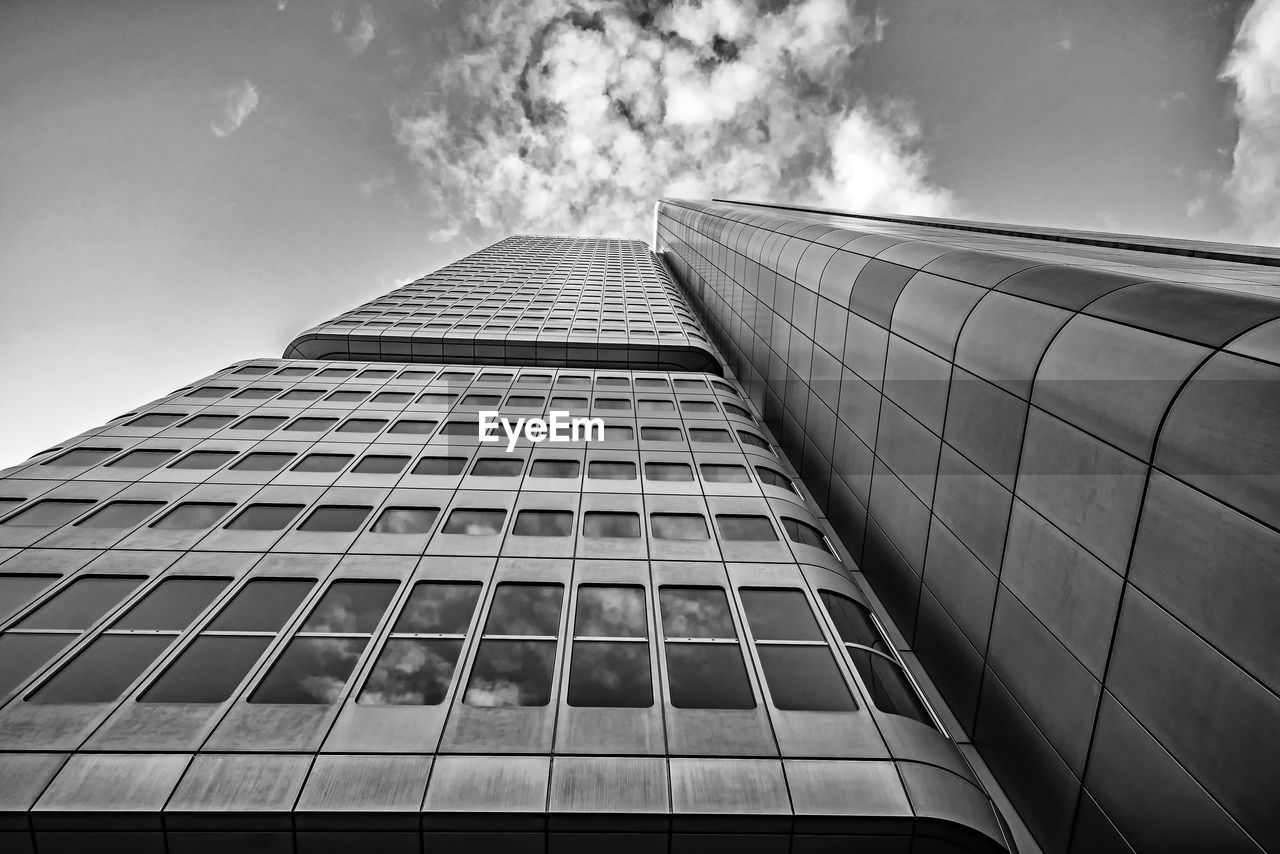 low angle view of modern buildings against sky