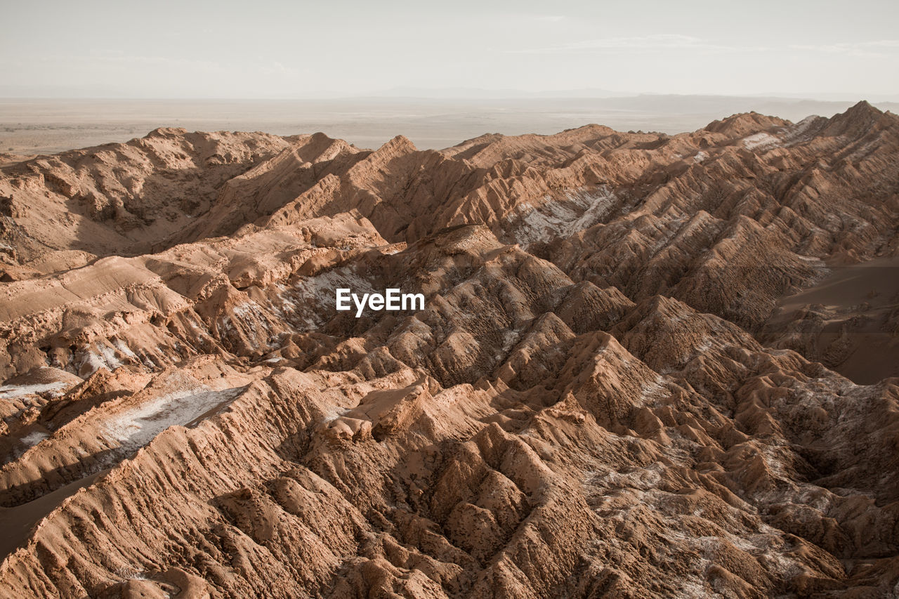 Scenic view of rock formations against sky