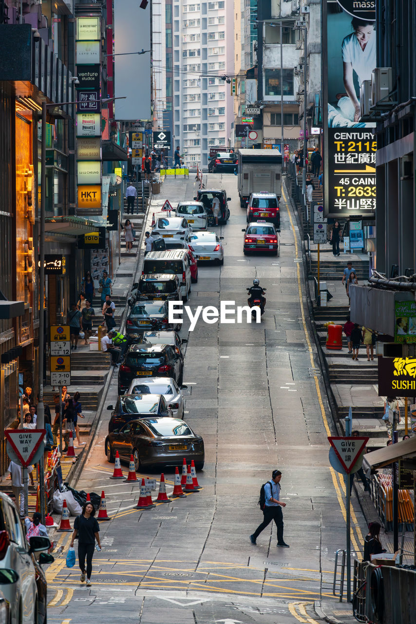 High angle view of people walking on street