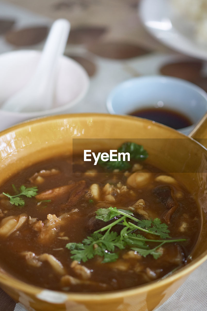 CLOSE-UP OF SOUP SERVED IN BOWL