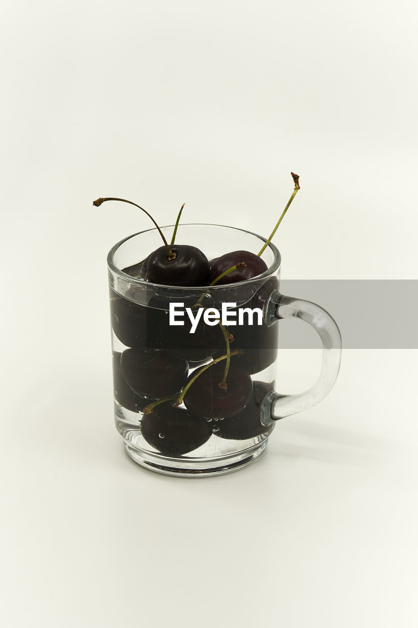 CLOSE-UP OF WINEGLASS ON TABLE