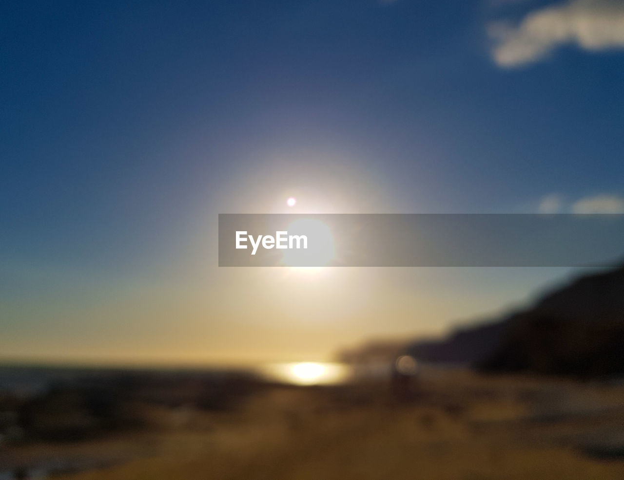 SCENIC VIEW OF SEA DURING SUNSET