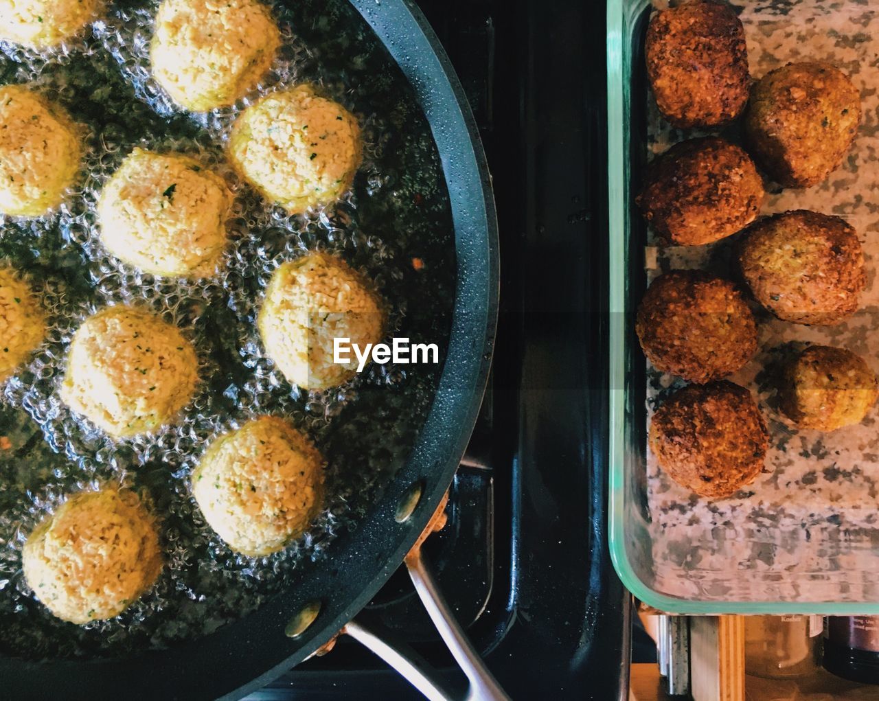 Directly above shot of meat in cooking pan