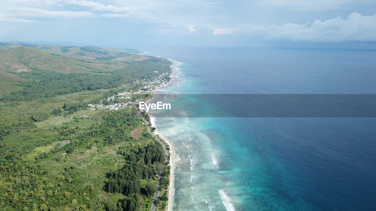 AERIAL VIEW OF SEA AND LANDSCAPE AGAINST SKY