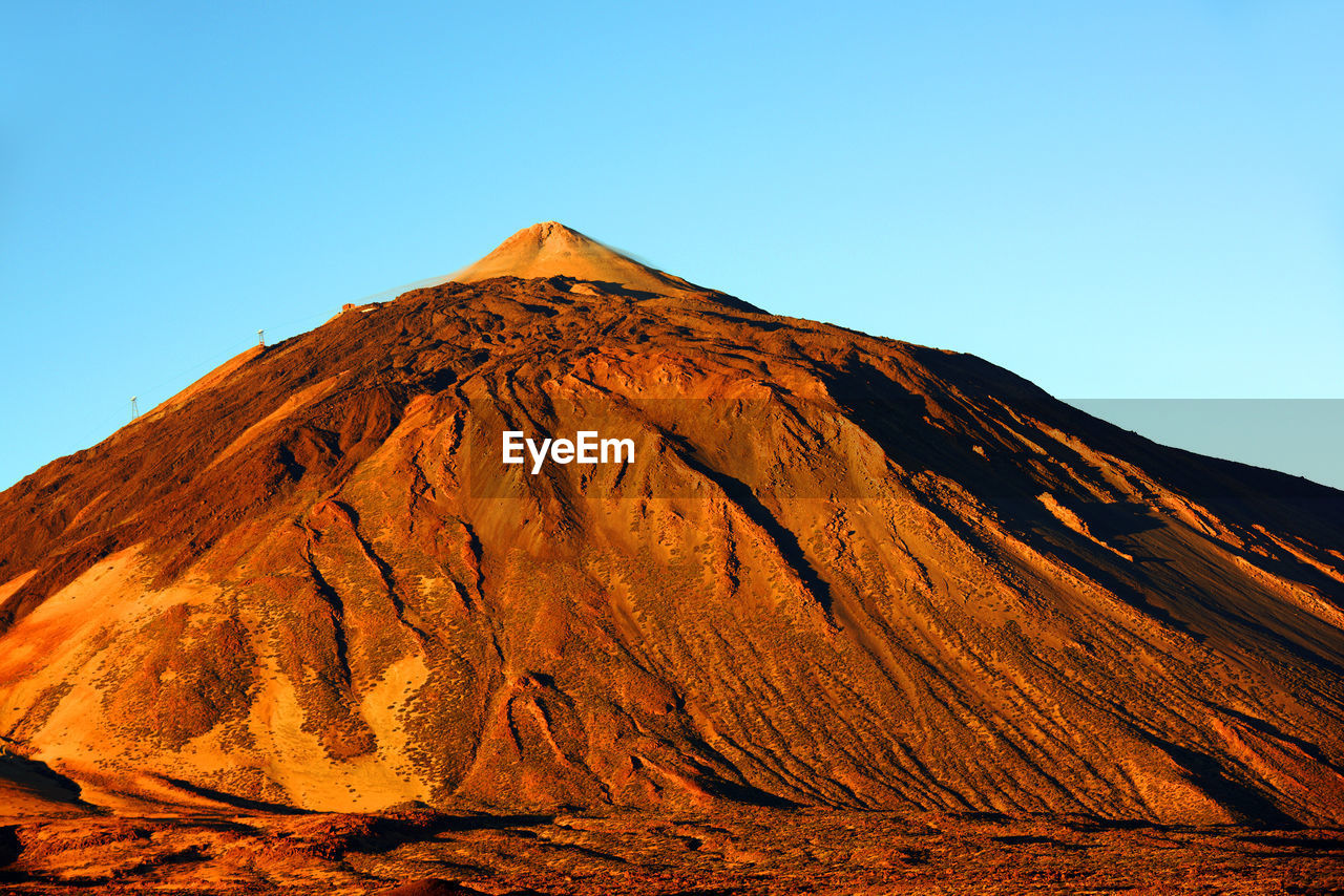 Rocky mountain at el teide national park against clear sky