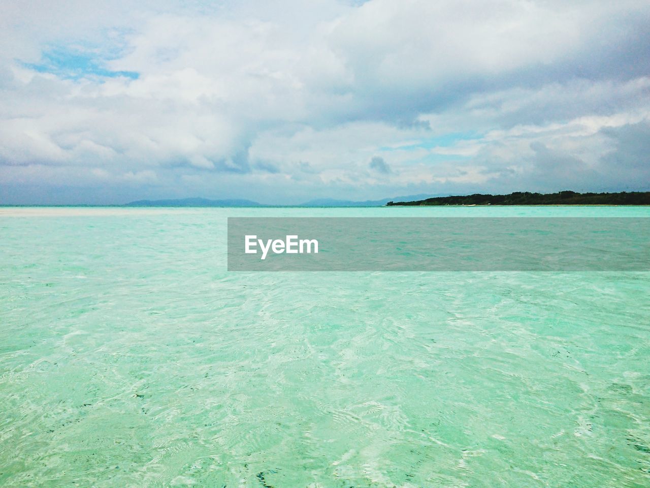 SCENIC VIEW OF BLUE SEA AGAINST SKY