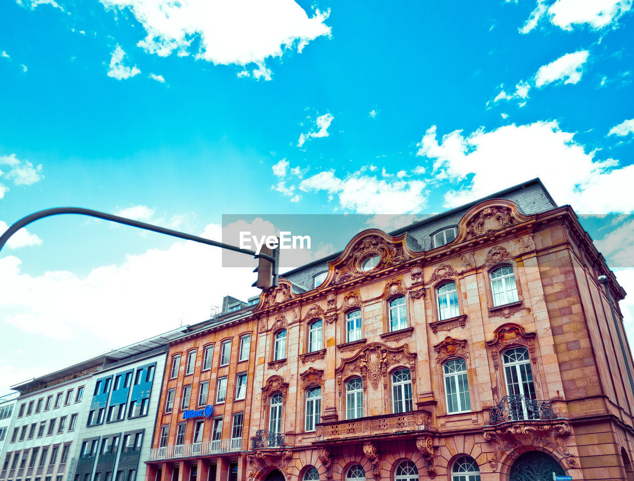 LOW ANGLE VIEW OF BUILT STRUCTURE AGAINST CLEAR BLUE SKY