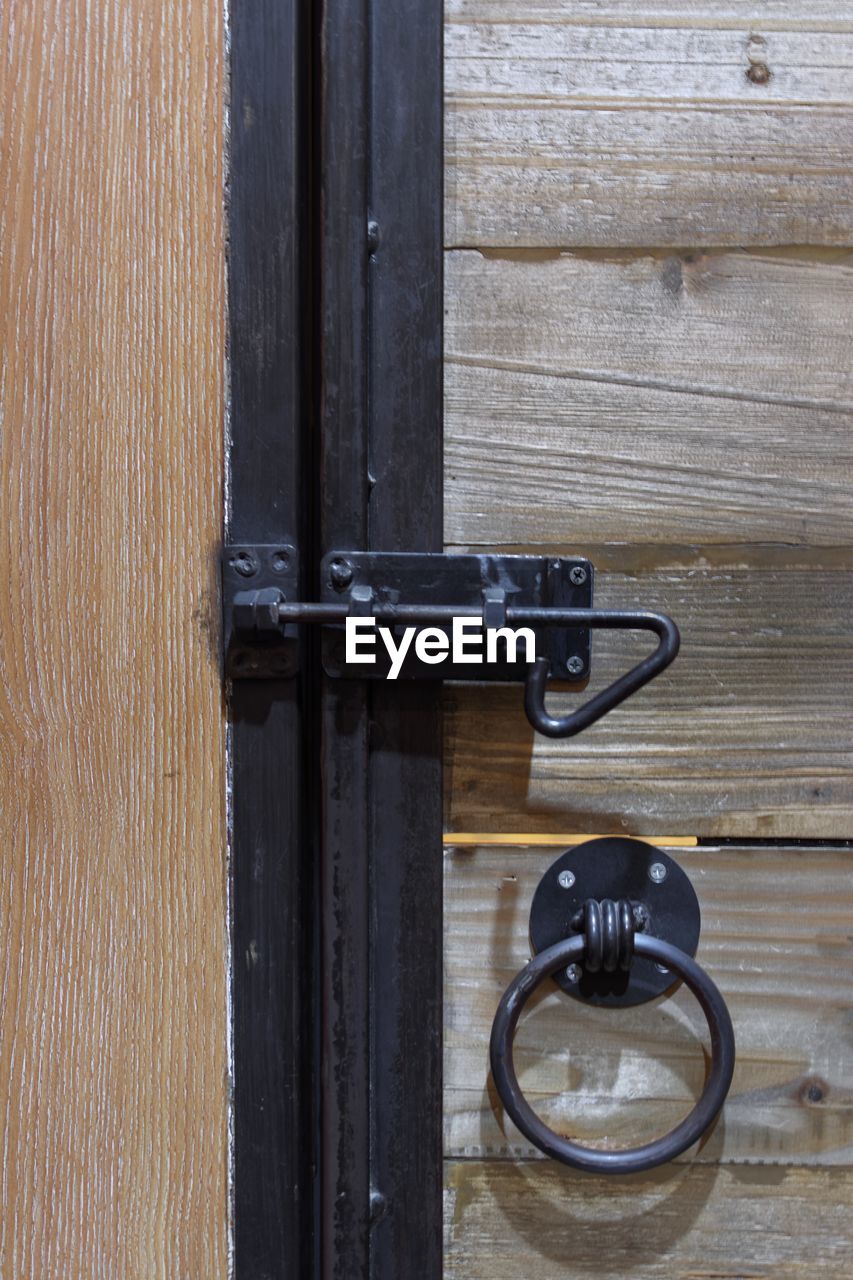 Close-up of closed wooden door