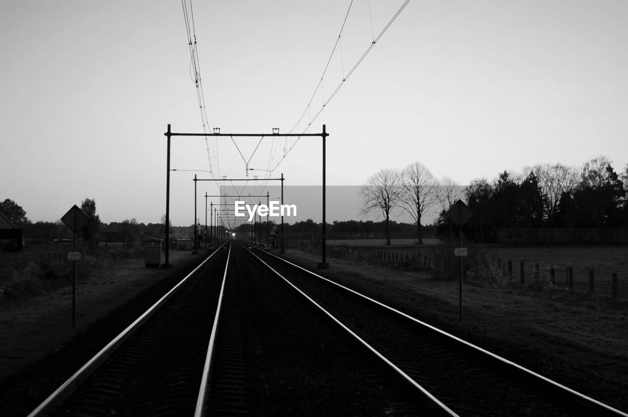 RAILROAD TRACK AGAINST SKY