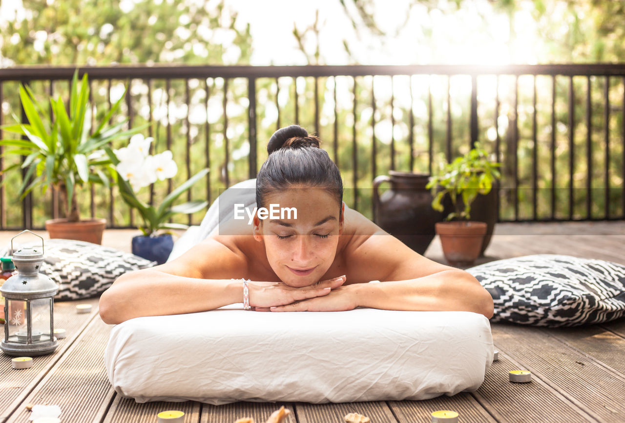 Woman lying at beauty spa