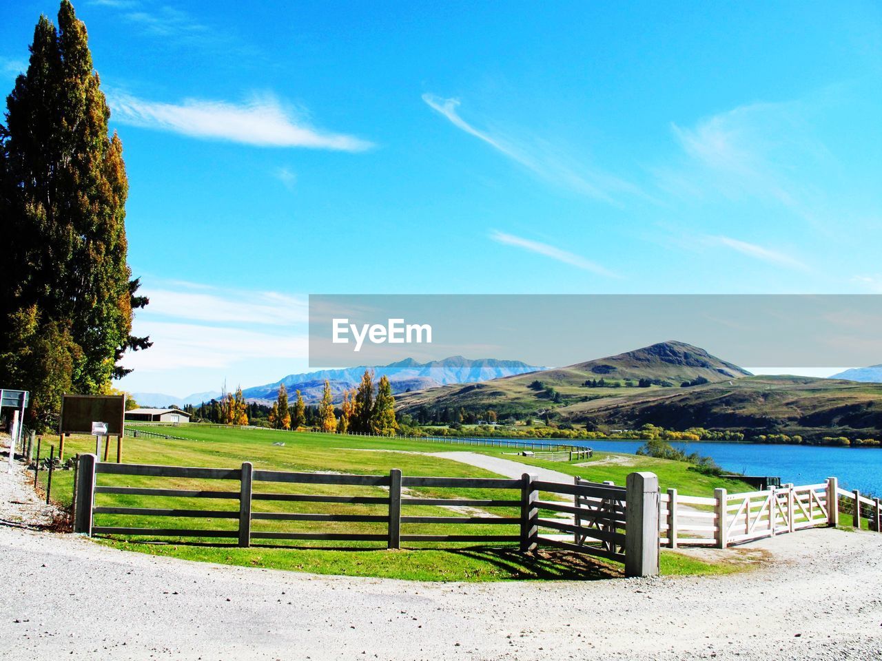 Scenic view of sunny landscape against sky