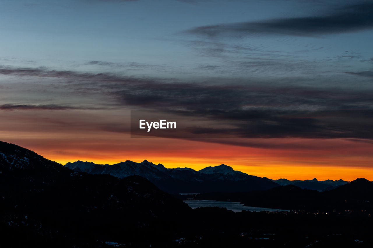 Scenic view of dramatic sky during sunset