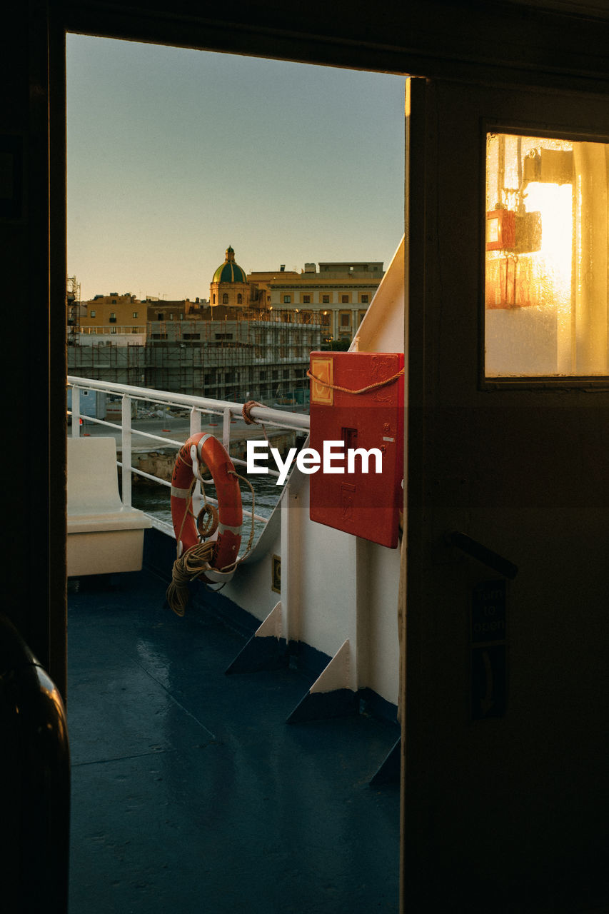 The sunset over the city from ferry boat, transportation.