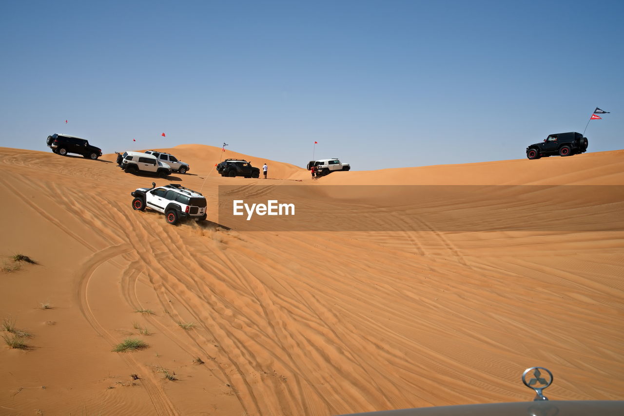 VIEW OF CARS ON DESERT