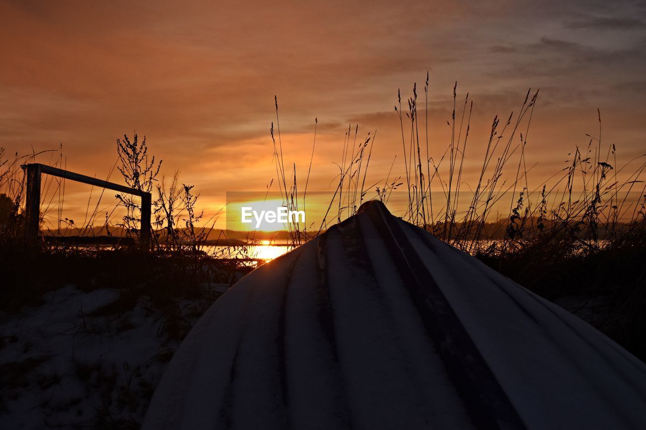 SCENIC VIEW OF SNOW COVERED LANDSCAPE AGAINST SKY