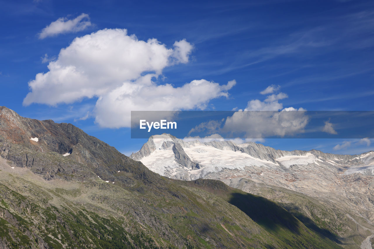 panoramic view of mountains against sky