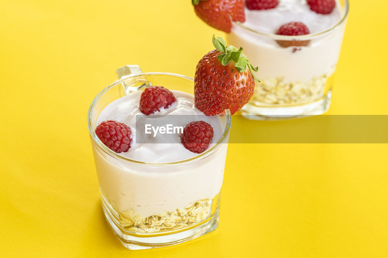 HIGH ANGLE VIEW OF BREAKFAST ON GLASS