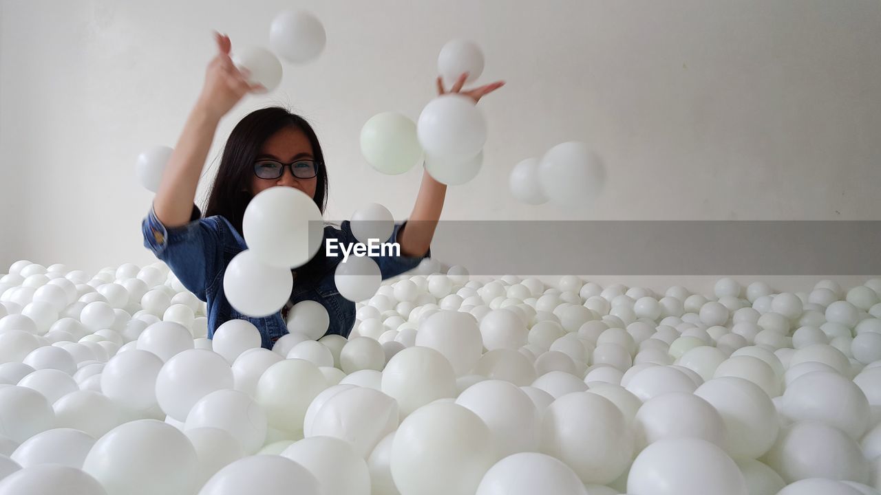 Woman enjoying in ball pool